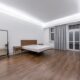 LED bedroom furniture setup with ceiling cove lighting, wooden bed frame, and nightstands in a modern bedroom