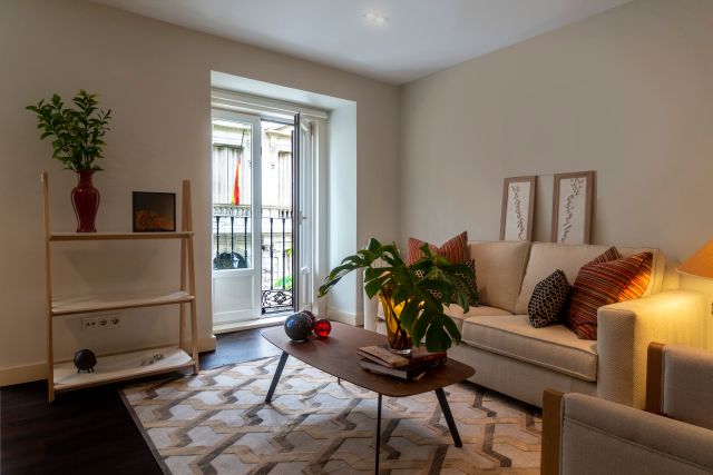 A small living room carpet only works if it's sized to your furniture, not your floor. Here's the sizing chart and placement rules to get it right