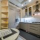 Small kitchen colors change how big a room feels — see which warm neutrals, light shades, and accent colors open up a tight footprint fast today.